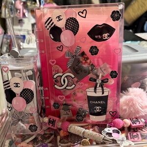 Pink and Black Accessory Set. Includes notebook, cup, keychain, magnifier & pen.